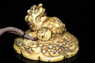 AKAEBISU-DOU TANAGOKORO "Masayuki signed Chinese trade stamp lion form"netsuke EDO period,FOR SALE