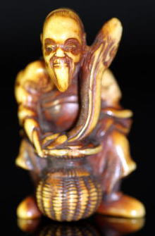 AKAEBISU-DOU TANAGOKORO "Eel and fisherman"netsuke EDO period,FOR SALE