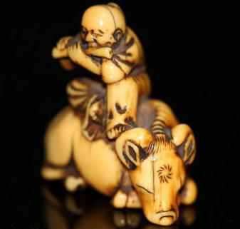 Symbol of ZEN thought "Coming Home on the Cow's Back netsuke Edo period 