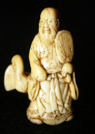 AKAEBISU-DOU TANAGOKORO "Chinese hermit wioth crane"netsuke EDO period,FOR SALE